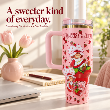 Strawberry Shortcake tumbler on a desk